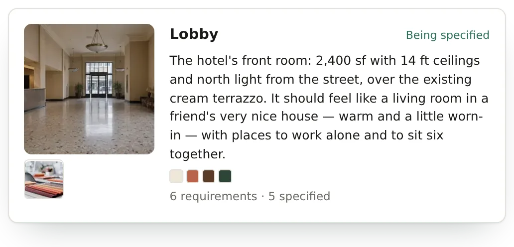 The example hotel’s lobby as its brief has it: a photo of the lobby, the room described, its four colors, and 6 requirements, 5 of them specified